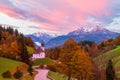 Beautiful Maria Gern church against the backdrop of the famous Watzmann Mountains in beautiful autumn colors near the charming