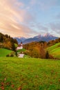 Beautiful Maria Gern church against the backdrop of the famous Watzmann Mountains in beautiful autumn colors near the charming