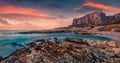 Beautiful marine scenery. Great spring sunset on Sicily, Isolidda Beach, San Vito cape, Italy