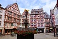 Market Square with fountain, flowers and half timbered buildings in Bernkastel Kues, Germany