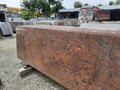 Beautiful maroon or brown and black color natural stone granite slab backdrop