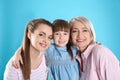 Beautiful mature woman with daughter and grandchild