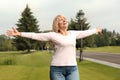 Beautiful mature woman outdoors on summer day Royalty Free Stock Photo