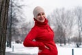 Beautiful Mature Woman In Red Sportswear After Jogging And Running Outdoors At Park. Lifestyle at Middle Age. Royalty Free Stock Photo