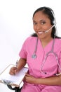 Beautiful Medical Receptionist Wearing Headset