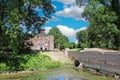 Beautiful medieval brick stone castle ruin, bridge over water moat - Kasteel Bleijenbeek, Afferden, Netherlands Royalty Free Stock Photo