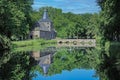 Beautiful medieval dutch castle, green forest, water moat - Arcen, Limburg, Netherlands Royalty Free Stock Photo