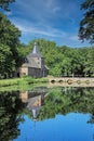 Beautiful medieval dutch castle, green forest, water moat - Arcen, Limburg, Netherlands Royalty Free Stock Photo