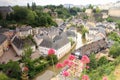 Beautiful medieval houses, a monastery, a stone bridge over the river, a top view of the city of Luxembourg, an old fortress, Royalty Free Stock Photo