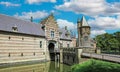 Beautiful medieval water moat castle entrance, bridge, towers - Kasteel Heeswijk, Netherlands Royalty Free Stock Photo