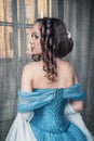 Beautiful medieval woman in blue dress Royalty Free Stock Photo