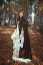 Beautiful medieval woman in a forest