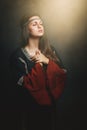 Beautiful medieval woman praying Royalty Free Stock Photo