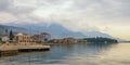 Beautiful Mediterranean landscape on cloudy winter day. Montenegro, view of embankment of Tivat city Royalty Free Stock Photo