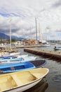 Beautiful Mediterranean landscape with fishing boats in harbor. Montenegro, view of Bay of Kotor near city of Tivat Royalty Free Stock Photo