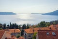 Beautiful Mediterranean landscape. Montenegro, Adriatic Sea. View of Bay of Kotor and red roofs of seaside town of Herceg Novi Royalty Free Stock Photo