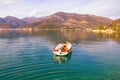 Beautiful Mediterranean landscape - mountains, sea and fishing boat on water. Montenegro, Bay of Kotor Royalty Free Stock Photo