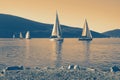 Beautiful Mediterranean landscape with sailing boats on water. Montenegro, Kotor Bay. Color tinting Royalty Free Stock Photo