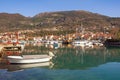 Beautiful Mediterranean landscape with small harbor for fishing boats.  Montenegro, Tivat city. View of Marina Kalimanj Royalty Free Stock Photo