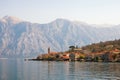 Beautiful Mediterranean landscape with a small seaside village in the background of the mountains. Montenegro, Bay of Kotor Royalty Free Stock Photo