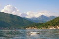 Beautiful  Mediterranean landscape  on sunny summer day - mountains, sea and fishing boat on the water.  Montenegro, Kotor Bay Royalty Free Stock Photo