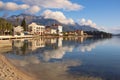 Beautiful Mediterranean landscape on sunny winter day. Embankment of Tivat city with Lovcen mountain in background. Montenegro Royalty Free Stock Photo