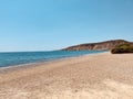 Beautiful Mediterranean landscape. View of empty wild beach and clear turquoise water of Mediterranean sea. Cyprus. Royalty Free Stock Photo