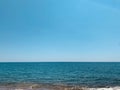 Beautiful Mediterranean landscape. View of empty wild beach and clear turquoise water of Mediterranean sea. Cyprus. Royalty Free Stock Photo