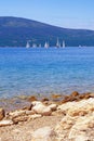 Beautiful Mediterranean landscape. View of Kotor Bay with sailboats on water. Montenegro, Adriatic Sea