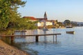 Beautiful Mediterranean landscape. View of seaside village and small wooden bridges on sunny autumn day. Montenegro, Bay of Kotor Royalty Free Stock Photo