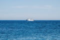 Beautiful Mediterranean sea and fishing boat on the horizon Royalty Free Stock Photo
