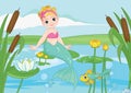 Beautiful mermaid girl in a swamp with water lilies