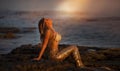 Beautiful mermaid sitting on a rock Royalty Free Stock Photo