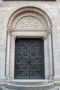 The beautiful metal door of Grossmunster , holy cathedral of Zurich, background Royalty Free Stock Photo