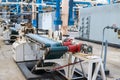 Beautiful metal industrial equipment of a production line at a machine-building plant, a conveyor with machine tools for products. Royalty Free Stock Photo