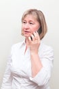 Beautiful middle age blond woman with mobile phone Royalty Free Stock Photo