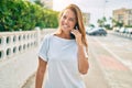 Beautiful middle age hispanic woman smiling speaking on the phone happy outdoors Royalty Free Stock Photo