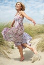 Beautiful middle aged woman dancing outdoors Royalty Free Stock Photo