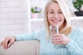 Beautiful middle aged woman drinking water in the morning Royalty Free Stock Photo