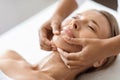 Beautiful Middle Aged Woman Getting Face Lifting Massage In Luxury Spa Salon Royalty Free Stock Photo