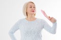 Beautiful middle aged woman with menopause blowing by fan. Hormone replacement therapy and mature woman healthcare. Mid age happy Royalty Free Stock Photo