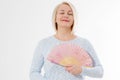 Beautiful middle aged woman with menopause blowing by fan. Hormone replacement therapy and mature woman healthcare. Mid age happy Royalty Free Stock Photo