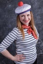 Beautiful midle aged lady having fun in sailor`s suit