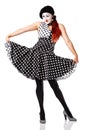 Beautiful mime in spotty dress posing