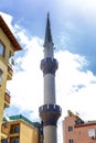 Beautiful minaret with an ornament in the eastern city.