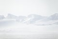 A beautiful, minimalist landscape of flat, snowy Norwegian field.