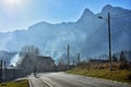 Beautiful misty landscape in well known Busteni mountain resort with Caraiman mountains in the background, Prahova Valley, Romania Royalty Free Stock Photo