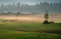 Beautiful misty sunrise over the village