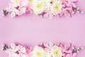 Beautiful mix flowers frame on soft pink romance background