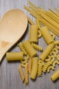 Beautiful Mixed Pastas and Wooden Spoon Royalty Free Stock Photo